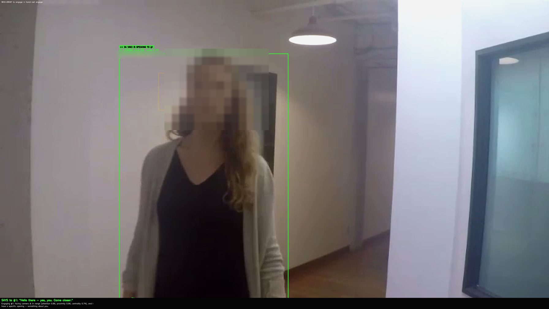 The system engaging a single person, that person's face de-identified